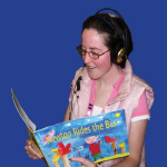 Participant reading Newton Rides a Bus book